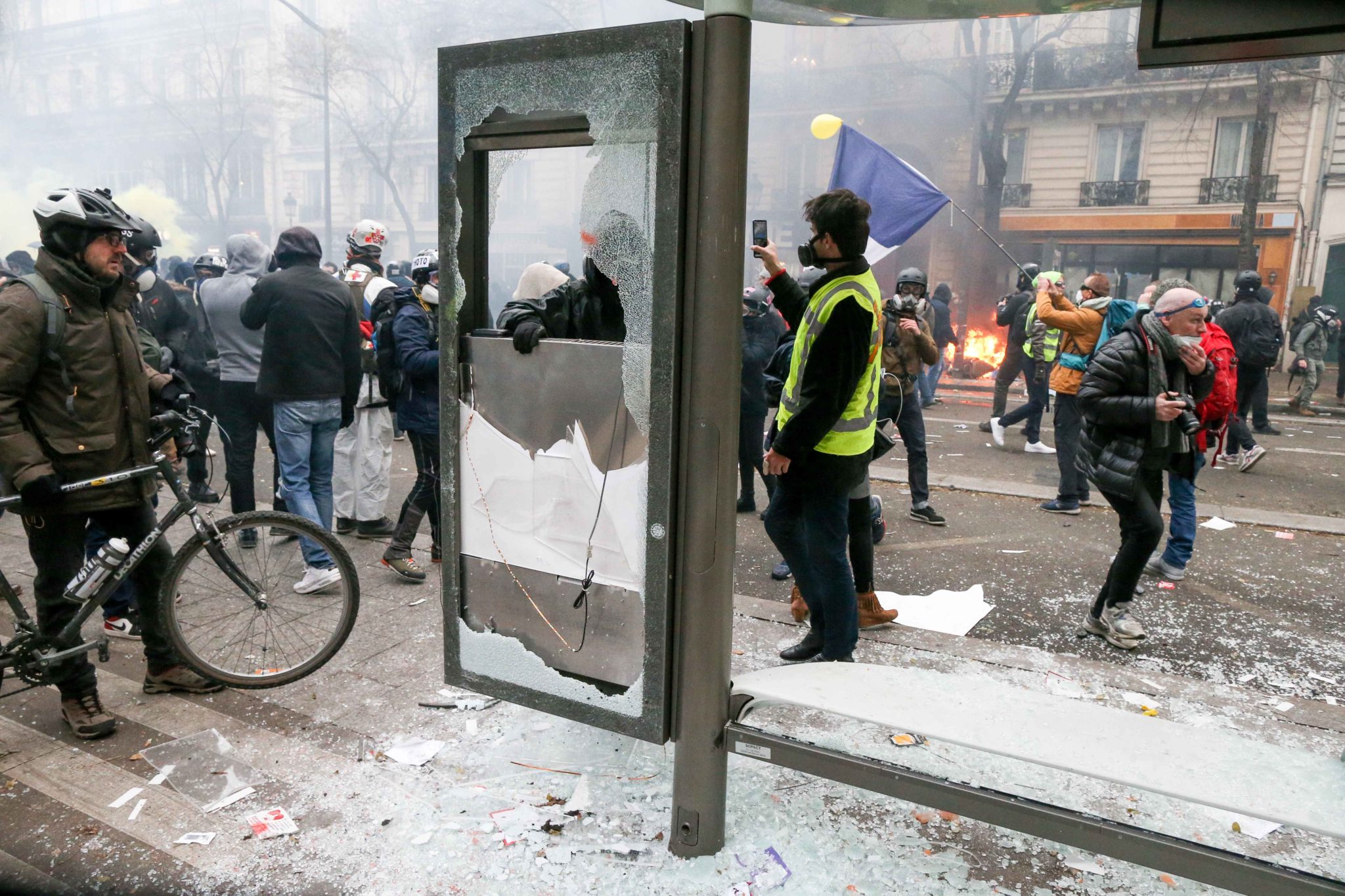 A bus bench is destroyed during a demontration to protest against the pension overhauls, in Paris, on December 5, 2019 as part of a national general strike. Trains cancelled, schools closed: France scrambled to make contingency plans on for a huge strike a A bus bench is destroyed during a demontration to protest against the pension overhauls, in Paris, on December 5, 2019 as part of a national general strike. Trains cancelled, schools closed: France scrambled to make contingency plans on for a huge strike a