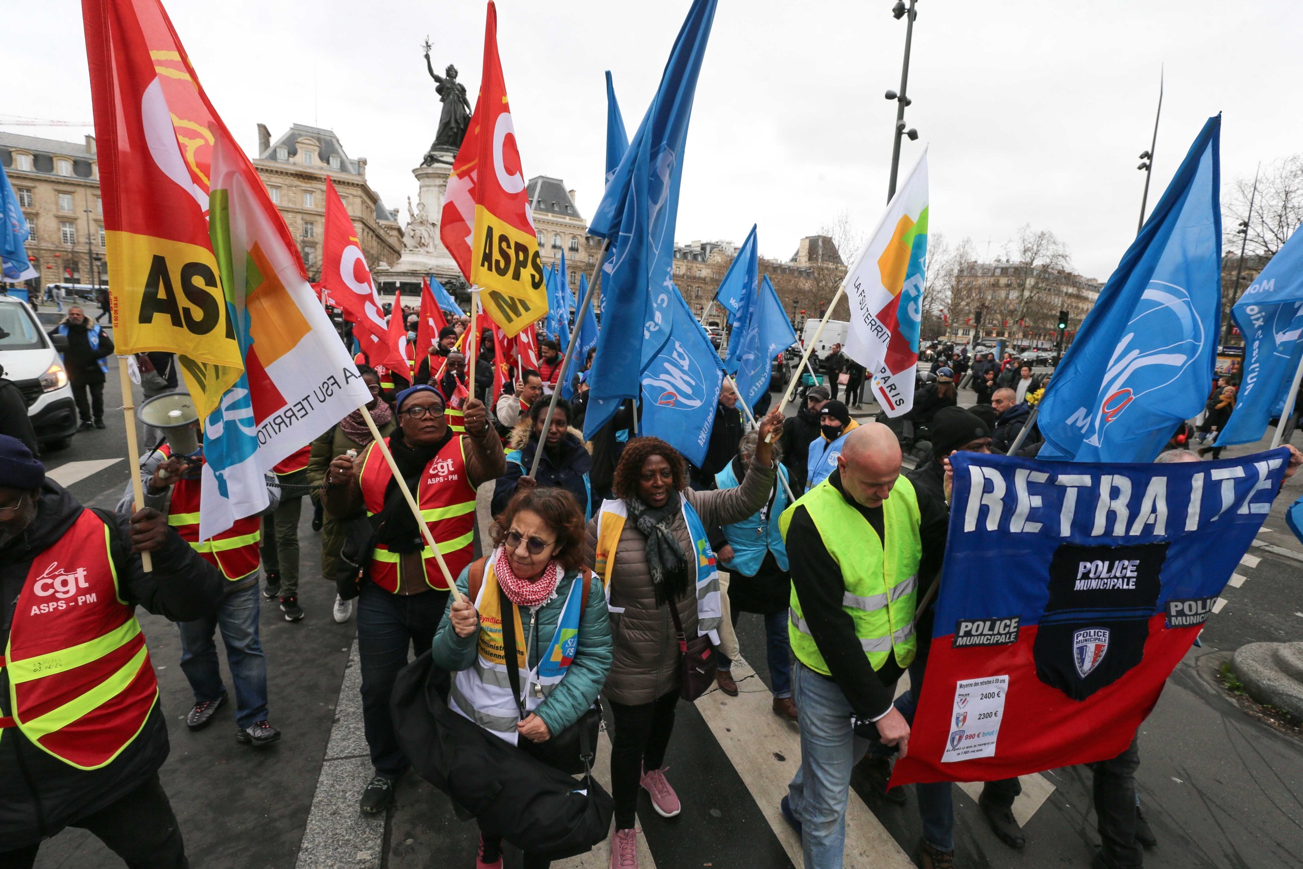 Protesters hold banners and unions flags during a demonstration of municipal police in Paris on February 3, 2024, as part of a nationwide movement launched by the "collective of angry municipal police officers" to demand better recognition of their work, Protesters hold banners and unions flags during a demonstration of municipal police in Paris on February 3, 2024, as part of a nationwide movement launched by the "collective of angry municipal police officers" to demand better recognition of their work,