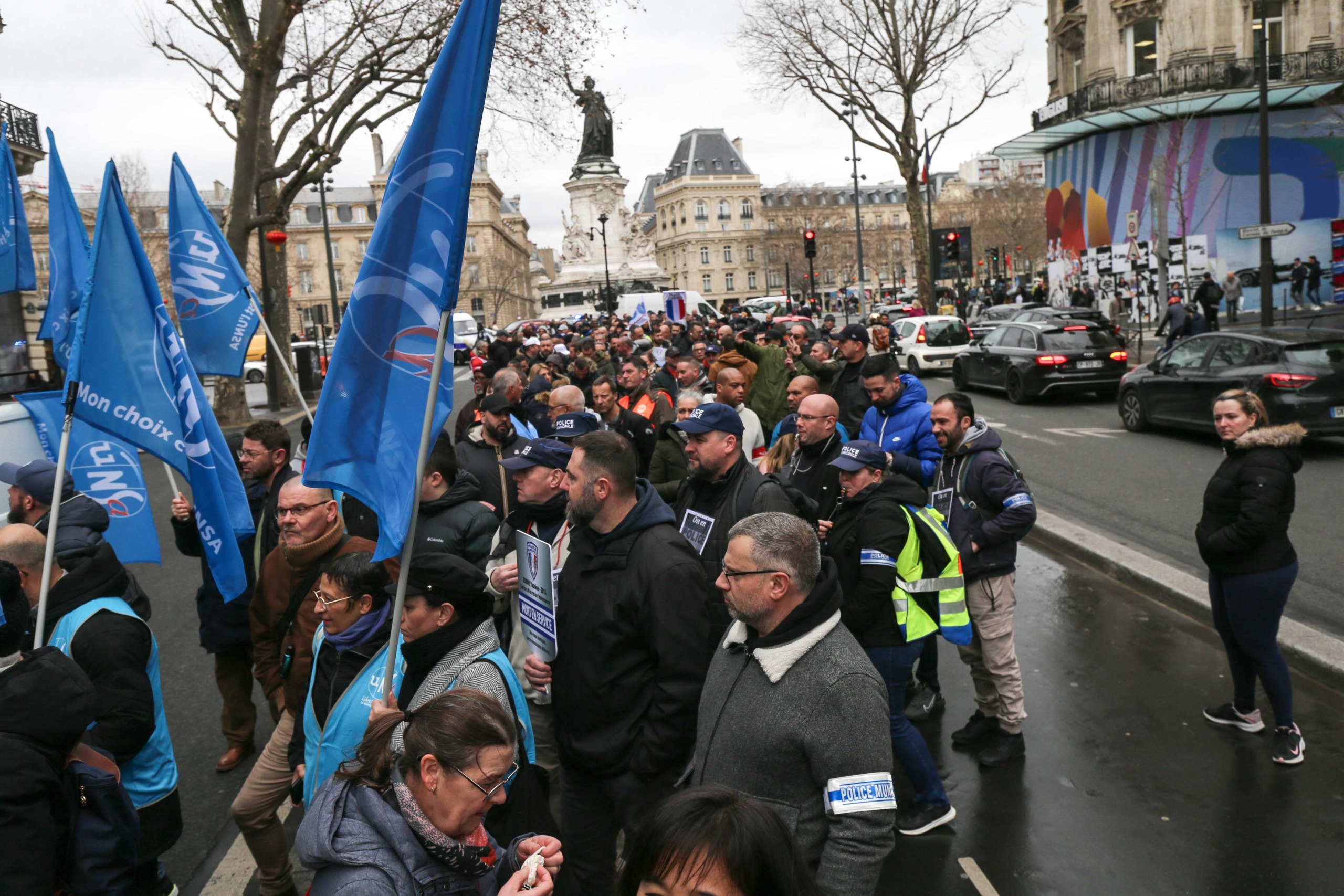 Protesters hold banners and unions flags during a demonstration of municipal police in Paris on February 3, 2024, as part of a nationwide movement launched by the "collective of angry municipal police officers" to demand better recognition of their work, Protesters hold banners and unions flags during a demonstration of municipal police in Paris on February 3, 2024, as part of a nationwide movement launched by the "collective of angry municipal police officers" to demand better recognition of their work,
