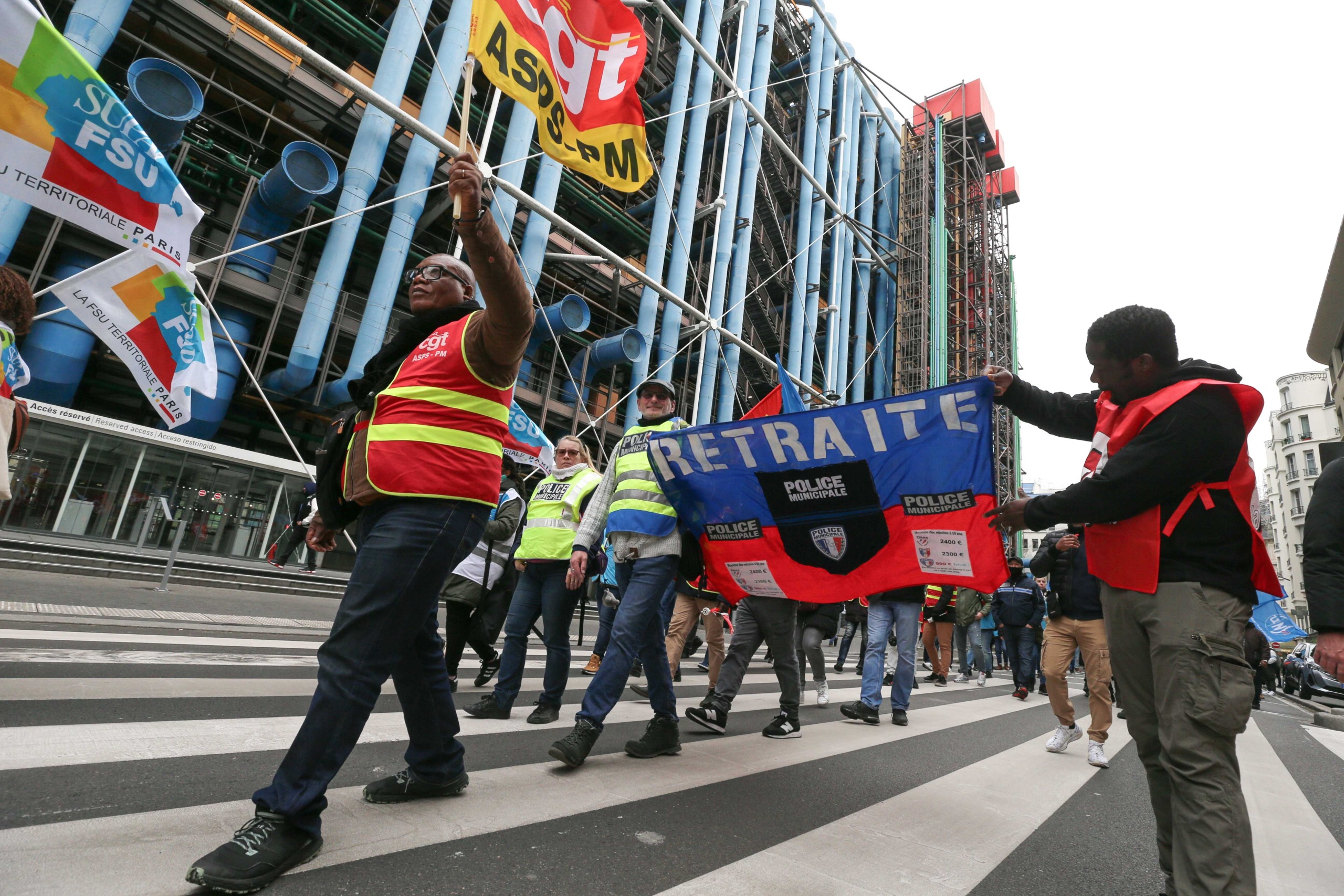 Protesters hold banners and unions flags during a demonstration of municipal police in Paris on February 3, 2024, as part of a nationwide movement launched by the "collective of angry municipal police officers" to demand better recognition of their work, Protesters hold banners and unions flags during a demonstration of municipal police in Paris on February 3, 2024, as part of a nationwide movement launched by the "collective of angry municipal police officers" to demand better recognition of their work,
