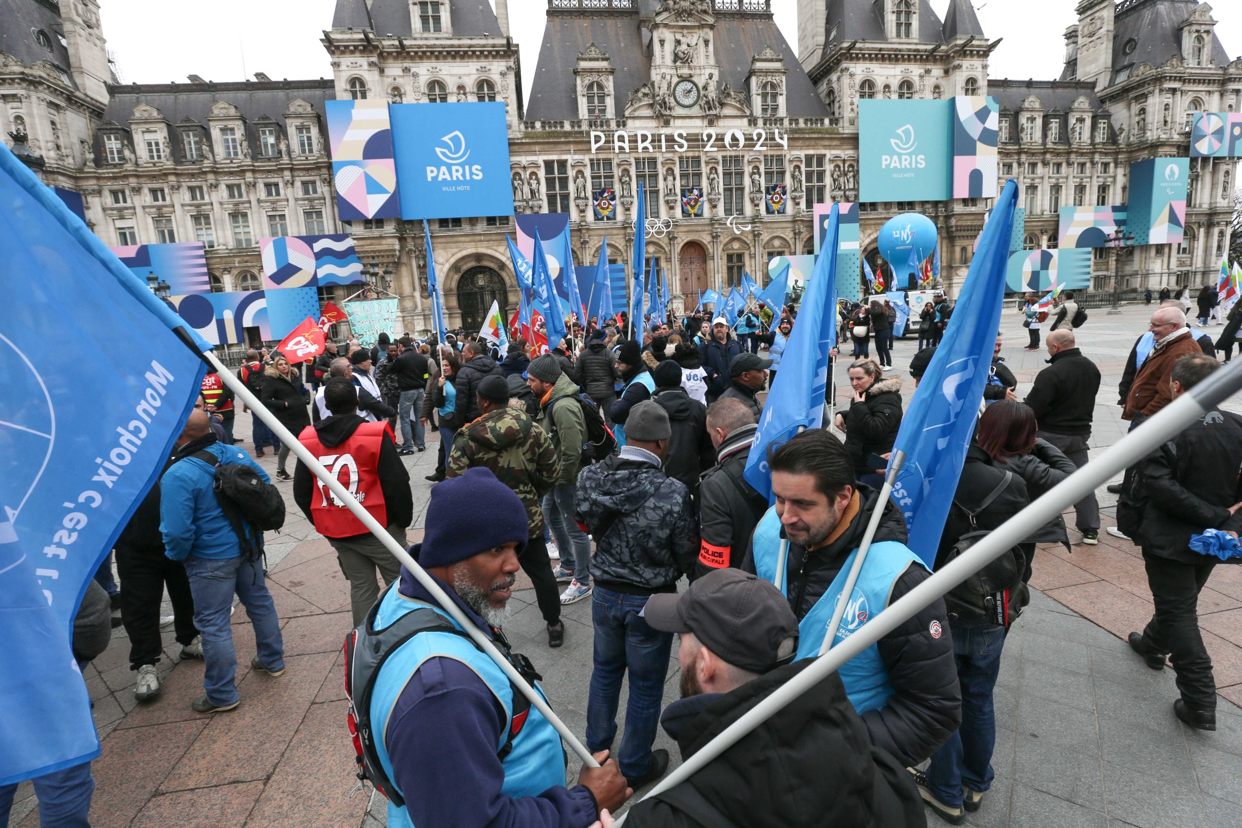 Protesters hold banners and unions flags during a demonstration of municipal police in Paris on February 3, 2024, as part of a nationwide movement launched by the "collective of angry municipal police officers" to demand better recognition of their work, Protesters hold banners and unions flags during a demonstration of municipal police in Paris on February 3, 2024, as part of a nationwide movement launched by the "collective of angry municipal police officers" to demand better recognition of their work,