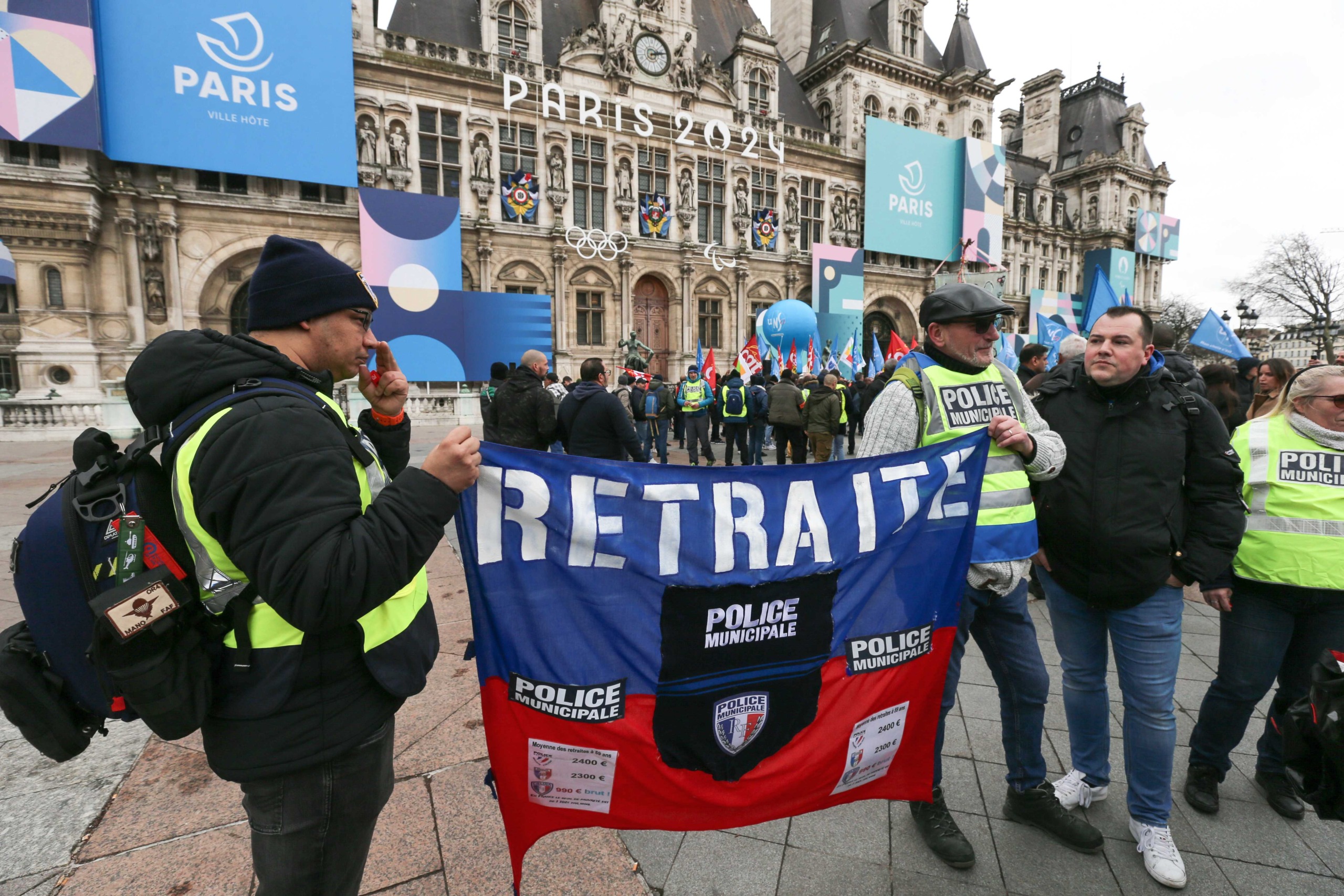 Protesters hold banners and unions flags during a demonstration of municipal police in Paris on February 3, 2024, as part of a nationwide movement launched by the "collective of angry municipal police officers" to demand better recognition of their work, Protesters hold banners and unions flags during a demonstration of municipal police in Paris on February 3, 2024, as part of a nationwide movement launched by the "collective of angry municipal police officers" to demand better recognition of their work,